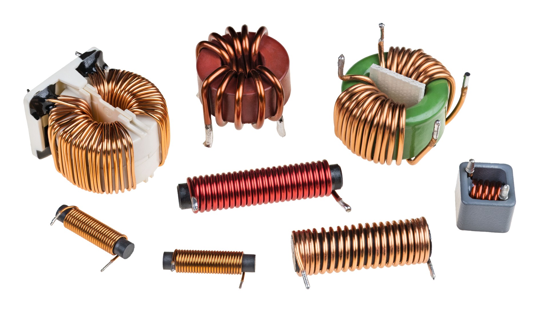 Set of toroid or cylindric coils with copper wire isolated on a white background